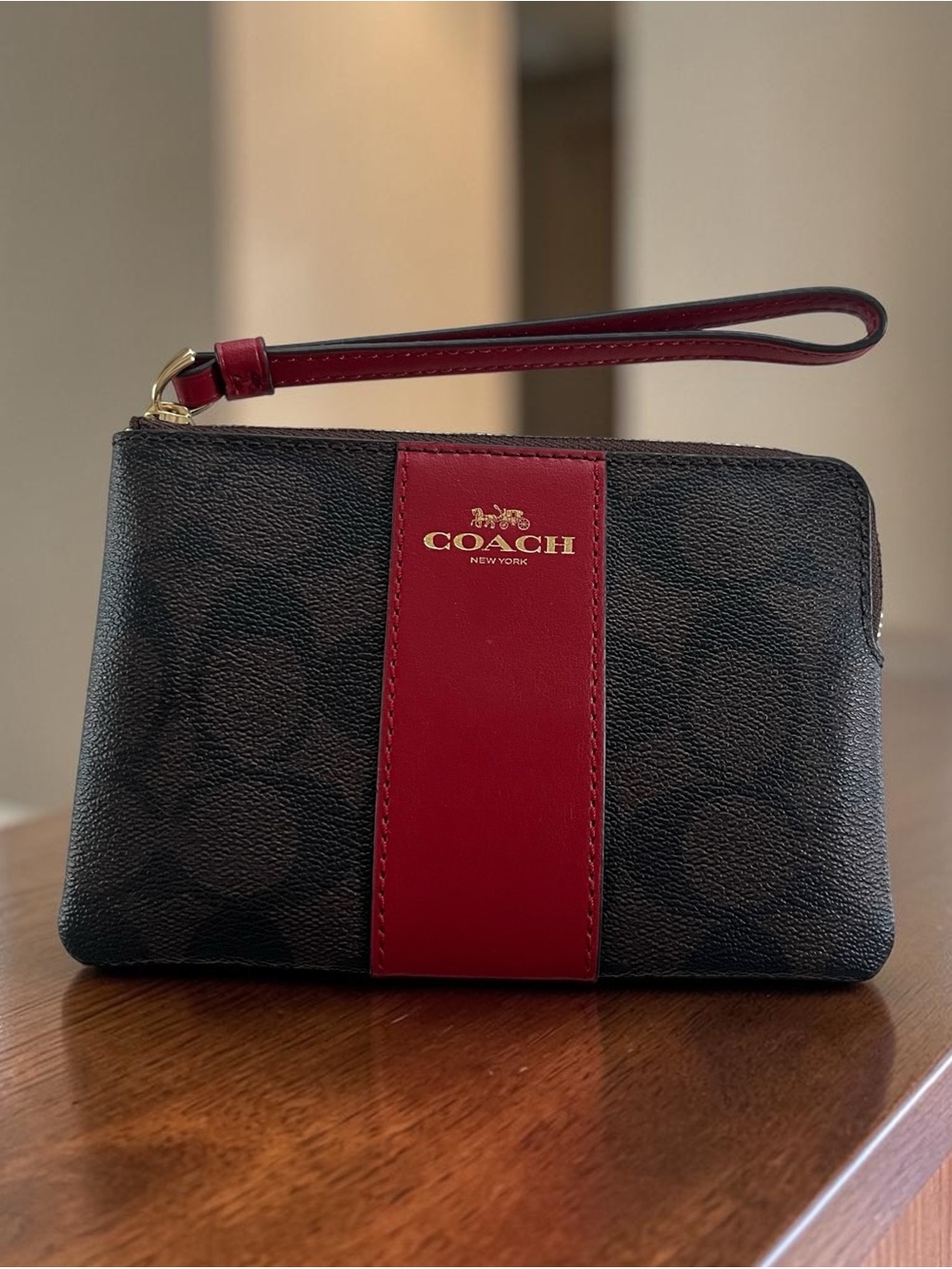 Coach Brown Signature Canvas Wristlet with Red Center Stripe